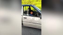 Nine-year-old boy drives father's car in Malaysia
