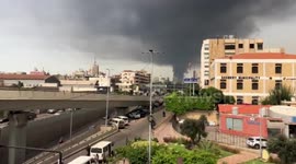Cloud of smoke engulfs sky after warehouse fire at Beirut port
