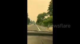 US: Time-Lapse Of Hazy Oregon Skies Getting Darker In Red