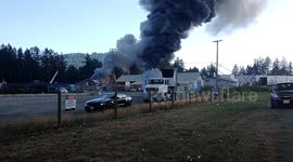 Close up of fire burning by Nanaimo Airport in the compound of Coldstar Solutions.