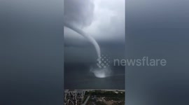 Huge waterspout swirls over sea in eastern China