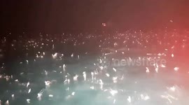 Thousands of jumping fish follow boat out to sea in Vietnam