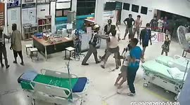 Shocking moment two rival gangs have mass brawl in hospital ward