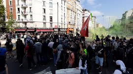 Protesters erect barricades as they march through Paris