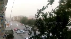 Sandstorm shakes trees as it blows through town in Turkey