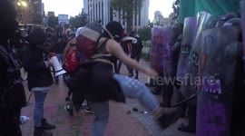 Feminist protesters clash with police in Colombian capital