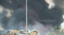 Emergency services rush to scene of Beirut port explosion as plumes of black smoke rise into the sky