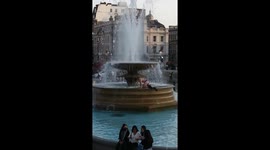 Man swims in Trafalgar square fountain