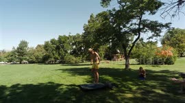 A young guy shows his talent in the park.