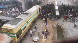 Bus crossing tracks is smashed by train and carried 800 meters in Nigeria