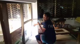 Huge python caught in Buddhist prayer room