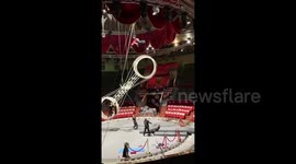 Russian gymnast performs daring stunts on huge revolving structure