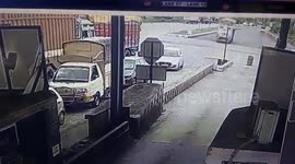 Truck loses control and rams into multiple vehicles at toll booth in southern India