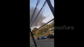 Shoe factory in Peru erupts into flames