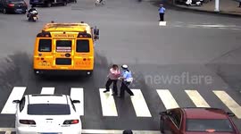 Chinese pedestrian slaps police officer trying to stop her crossing a red light