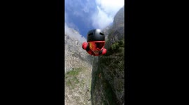 Incredible helmet camera footage of base jumper's rapid descent into Italian canyon