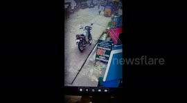 Moment biker makes stunning maneuver to avert head-on collision with bus