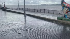 Calming and raining day with an electrical unicycle ride at teh river in liverpool