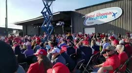 No social distancing, few masks as crowd waits for Trump rally in Wisconsin