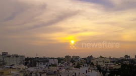 Watch Indian sunset as clouds change from yellow to orange to pruple