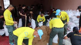 Residents prepare flood sandbags as Typhoon Noul reaches Thailand