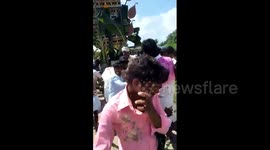 Several injured as 40-foot-tall chariot topples onto devotees during Indian procession