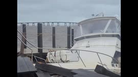 Fishing yacht breaks loose and slams into marina at Florida's Navarre during Hurricane Sally