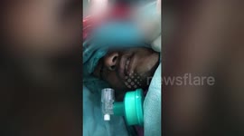 Graphic Content: Doctors keep talking to patient as they perform complex brain surgery in northern India