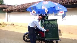 Heroic teacher reaches students with blackboard strapped to bike amid coronavirus pandemic