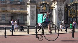 Deliveroo Man uses a Penny Farthing as he makes trip past Buckingham Palace!