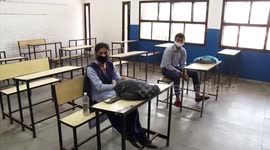 Schools and colleges partially reopen in India after being shut for six months