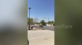 Tanker plane collects water to drop on Bobcat Fire in California