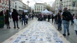 Demonstrators in Madrid protest the cancellation of local fairs