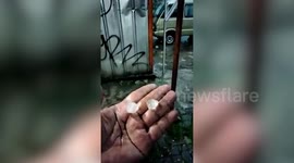 Hail storms hit Indonesia uprooting trees and blowing off roofs