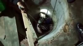 Rescuers rappel down 65ft deep well to save stray kitten