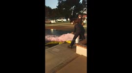 Santa Ana home fire, firefighter is purging the hydrant