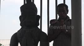 Man who earns £3 a day collecting plastic bottles spends life savings to build statue of himself