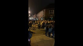 UK drinkers take party to the street after pubs close at 10 pm