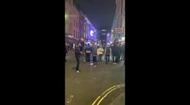 Busy streets in Soho, London at 10pm on first weekend of curfew