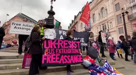 Activists staged a protest in support of Wikileaks founder Julian Assange in Piccadilly Circus