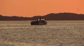 Lobster Boat Hauling Traps In New England