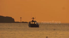 Lobster Boats Hauling Traps Off The Coast Of Boston Early In The Morning