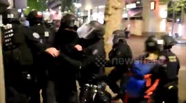 US: Police Officers Pin Journalist To The Ground During Portland Protest