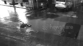 Car runs over alleged drunk man laying on road in southwest China