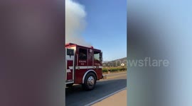 Fire engines seen rushing towards Glass Fire near St. Helena, California