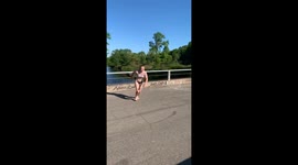 US girl lands face down while trying to front flip off bridge