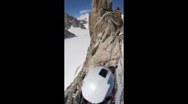 Terrifying POV of climber on thin Alpine mountain ridge