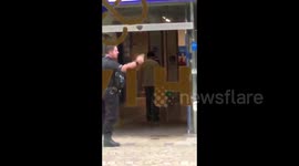 UK man surrenders after 12-hour standoff in high street bank