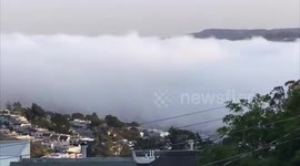 Fog blankets San Fransisco skyline as wildfires choke California