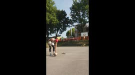 Spin trickshot with two balls from half court.